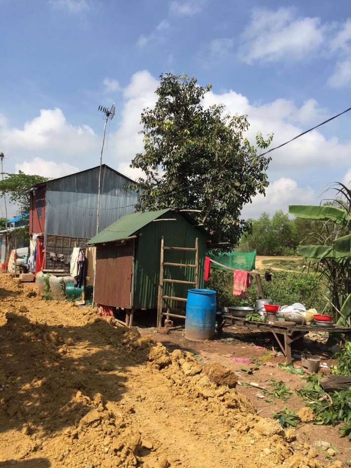 The houses and roads in the village. The paths make the villagers even difficult in getting water.